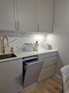 Nhà bếp/bếp nhỏ tại Blue Sky Apartment & SPA Dziwnów