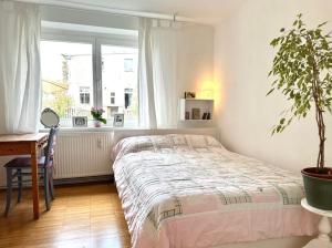 Postel nebo postele na pokoji v ubytování Gartenblick im Schwalbennest