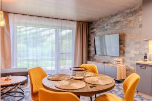TV a/nebo společenská místnost v ubytování Apartmán F2 Hrabušice
