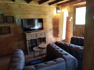 Фотография из галереи Wooden Lodge в городе Saint-Blimont +5 фотографий