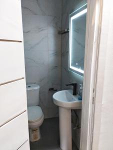 Koupelna v ubytování Cosse Apartment