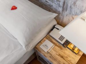 Postel nebo postele na pokoji v ubytování Boutique Hotel Art de Vivre & SPA