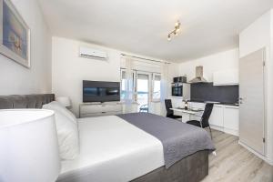 Postel nebo postele na pokoji v ubytování Studio Apartment Iva