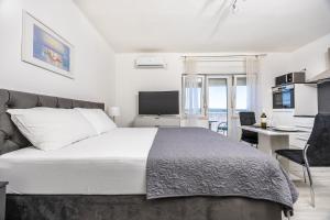 TV a/nebo společenská místnost v ubytování Studio Apartment Iva