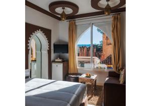 Letto o letti in una camera di Riad Hicham