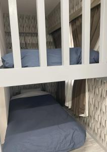 Voodi või voodid majutusasutuse ホテルパレスイン豊田 toas