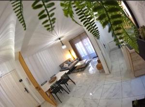 a living room with a couch and a table at Villa Aubagne Gémenos in Aubagne