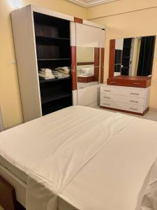 Letto o letti in una camera di The fabulous appt with pool in Virage Yoff Dakar