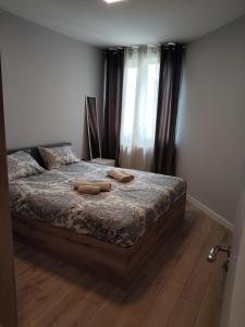 Ένα ή περισσότερα κρεβάτια σε δωμάτιο στο Your Sweet Home