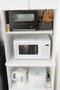 Kuchyň nebo kuchyňský kout v ubytování Nice Pad