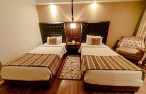 Postel nebo postele na pokoji v ubytování Hotel Star Simon delhi