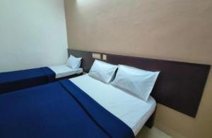 Postel nebo postele na pokoji v ubytování Hotel Star Simon delhi