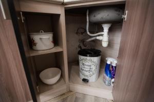 a small bathroom with a toilet and a sink at SelfHouse in Masazır +30 photos