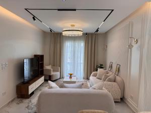 Posezení v ubytování Luxury Penthouse apartment Mountain View Hyde park 3 master bedrooms ماونتن فيو هايد بارك شقة فاخرة