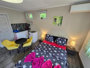 Posteľ alebo postele v izbe v ubytovaní Tom Apartmans