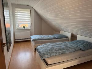 Postel nebo postele na pokoji v ubytování Casa Blanca 3