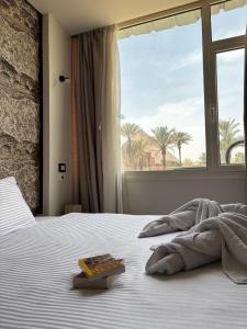 Postel nebo postele na pokoji v ubytování Master pyramids Hotel