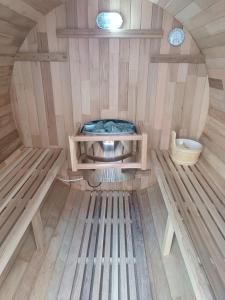 a small room with a toilet and a sink at Blue Aura Beach villa Larnaca in Perivolia