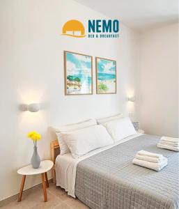 Postel nebo postele na pokoji v ubytování NEMO BnB ALGHERO CENTRE