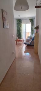 a large living room with couches and a table at Garrucha Calma y Luz in Garrucha