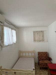 Postel nebo postele na pokoji v ubytování Kumborski Ribar