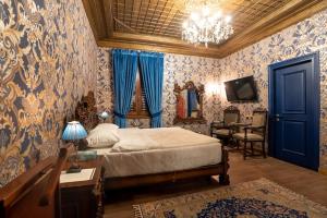 Postel nebo postele na pokoji v ubytování Castle Boutique Hotel
