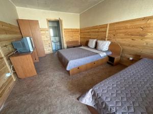 Postel nebo postele na pokoji v ubytování Микрон