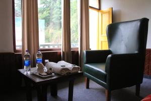Istumisnurk majutusasutuses The Village Manali- Café, Bar & Bistro
