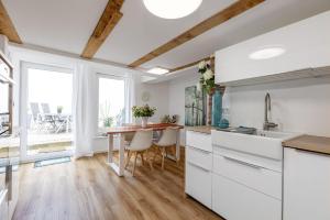 Kuchyň nebo kuchyňský kout v ubytování Dream Green Apartment 'Meadow'