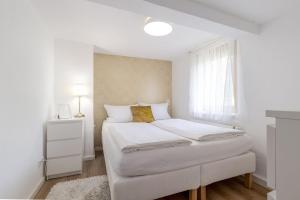 Postel nebo postele na pokoji v ubytování Dream Green Apartment 'Meadow'