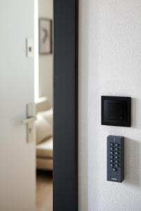 a close up of a door with a remote control at THE HOUSE near Lake & Old Town in Olsztyn