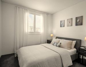 Ένα ή περισσότερα κρεβάτια σε δωμάτιο στο The Loft