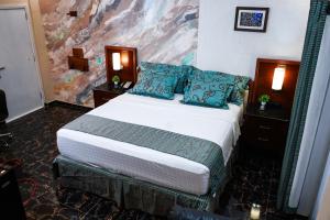 Postel nebo postele na pokoji v ubytování EKA ELITE HOTEL + 37 fotografií