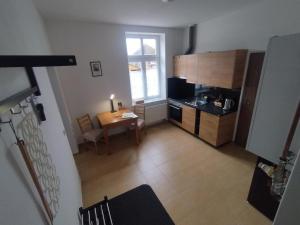 Η κουζίνα ή μικρή κουζίνα στο Apartmán u lázní +4 φωτογραφίες