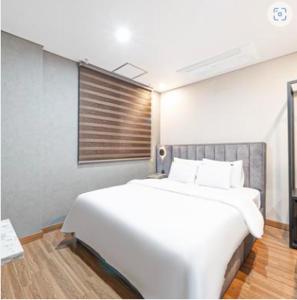 Postel nebo postele na pokoji v ubytování Kaiser hotel
