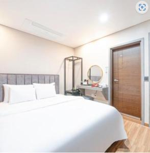 Postel nebo postele na pokoji v ubytování Kaiser hotel