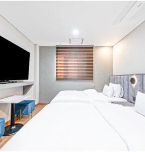 Postel nebo postele na pokoji v ubytování Kaiser hotel
