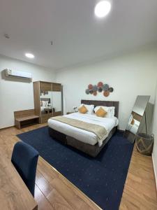 Postel nebo postele na pokoji v ubytování As Salam Apartment