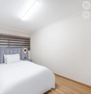 Postel nebo postele na pokoji v ubytování Kaiser hotel