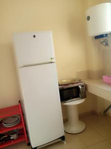 Una cocina o cocineta en Saloumi Appartment