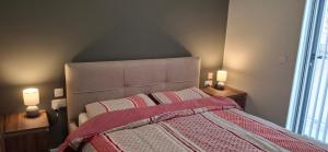 Ένα ή περισσότερα κρεβάτια σε δωμάτιο στο Xlendi Bay 2BR with Sea Views
