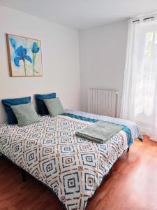 Postel nebo postele na pokoji v ubytování Maison authentique du Vexin + 12 fotografií