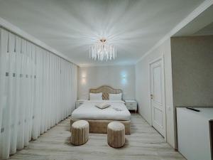 Postel nebo postele na pokoji v ubytování Old Yerevan Boutique Hotel