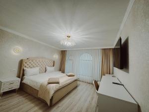 Voodi või voodid majutusasutuse Old Yerevan Boutique Hotel toas