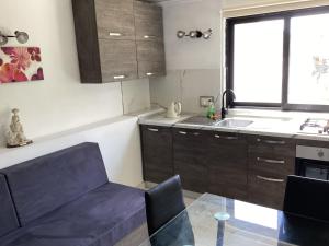Η κουζίνα ή μικρή κουζίνα στο Whitestar Guesthouse