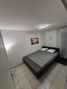 Postel nebo postele na pokoji v ubytování Appartement proche de Genève