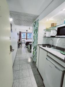 a kitchen with a sink and a counter top at CORAZOn BUENOs AIREs PLATINo in Buenos Aires