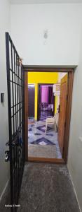 Ένα ή περισσότερα κρεβάτια σε δωμάτιο στο MURALI homestay near airport with shuttle service
