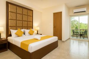 Postel nebo postele na pokoji v ubytování Casa Da Village Calangute Goa + 37 fotografií