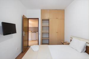 Postel nebo postele na pokoji v ubytování Vila Simon